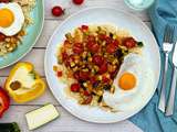 Semoule aux légumes d'été épicés et oeuf sur le plat