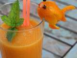 Smoothie melon pêches et son décor poisson en kumquat