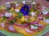 Carpaccio de tomates ananas et tomates noires de Crimée, feta grillée à l'origan