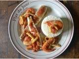 Loup entier en sauce tomate, calamars et crevettes