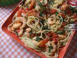 Spaghettis à la roquette,aux crevettes, jambon de Parme et tomates