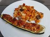 Courgettes farcies aux saucisses, feta et tomates confites