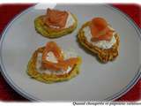 Blinis de pommes de terre, creme acidulee, truite fumee