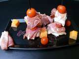 Brochette de melon , chiffonnade de jambon cru et tomate cerise