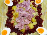 Salade de pommes de terre aux betteraves et tête de porc roulé