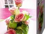 Dites le avec des fleurs.................Centre de table pomme granny smith et roses