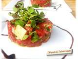 Tartare de boeuf à l'huile de truffe, parmesan et roquette