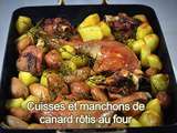 Cuisses et manchons de canard rôtis au four sur un lit de pommes de terre